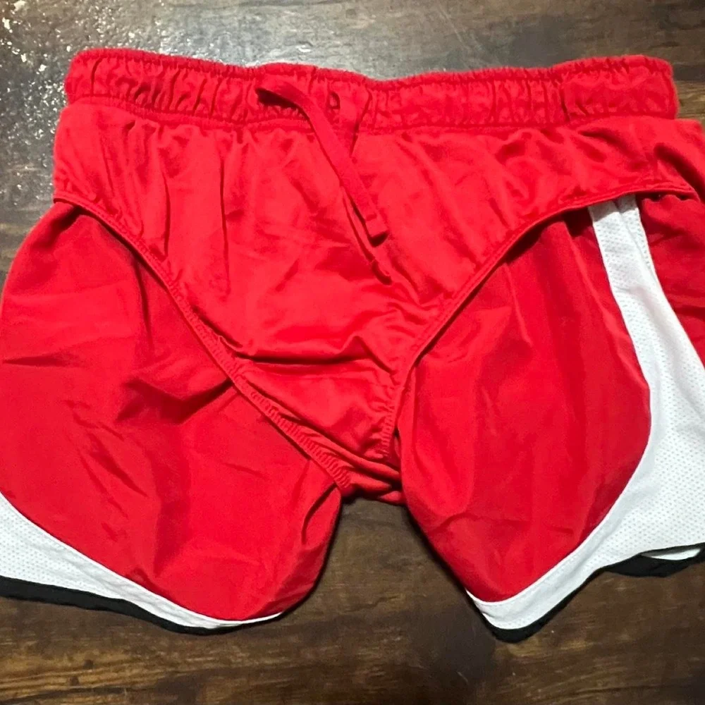 Nike red shorts with white/black side panels, size XS 427.5